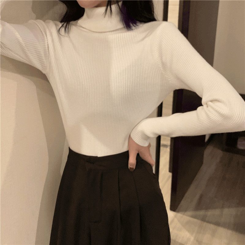 高襟のニットの底のシャツの女性の長袖の秋冬の新型の百合のセーターの女性は学生を厚くして身を修めて上着を掛けます。|undefined