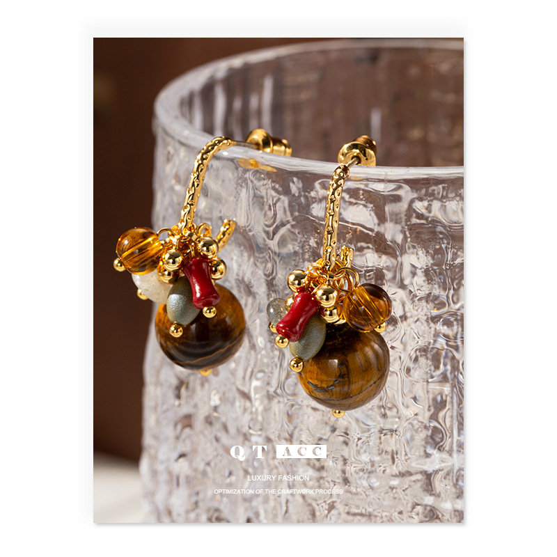 Europa y América de moda retro natural ojo de tigre colgante pendientes de orejas simple versátil otoño y invierno estilo de alta sensación delicado pendientes de orejas mujeres