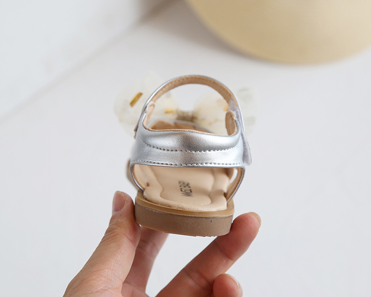 Versione coreana di fiori dolci da bambina con grande fiocco, scarpe per bambini, sandali per le vacanze al mare, estate 2021_voghion.com