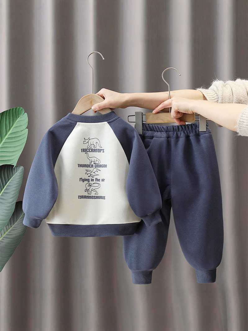 7105 traje de primavera para bebés 2025 nuevo suéter de manga raglán de dibujos animados para niños de dos piezas de primavera y otoño