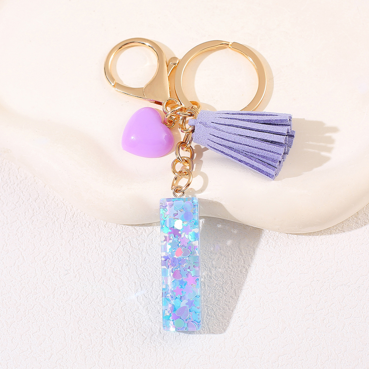 Nuevo estilo de mujer amor púrpura bordilla 26 letras llavero encantador llavero de automóvil pareja joyas mochila