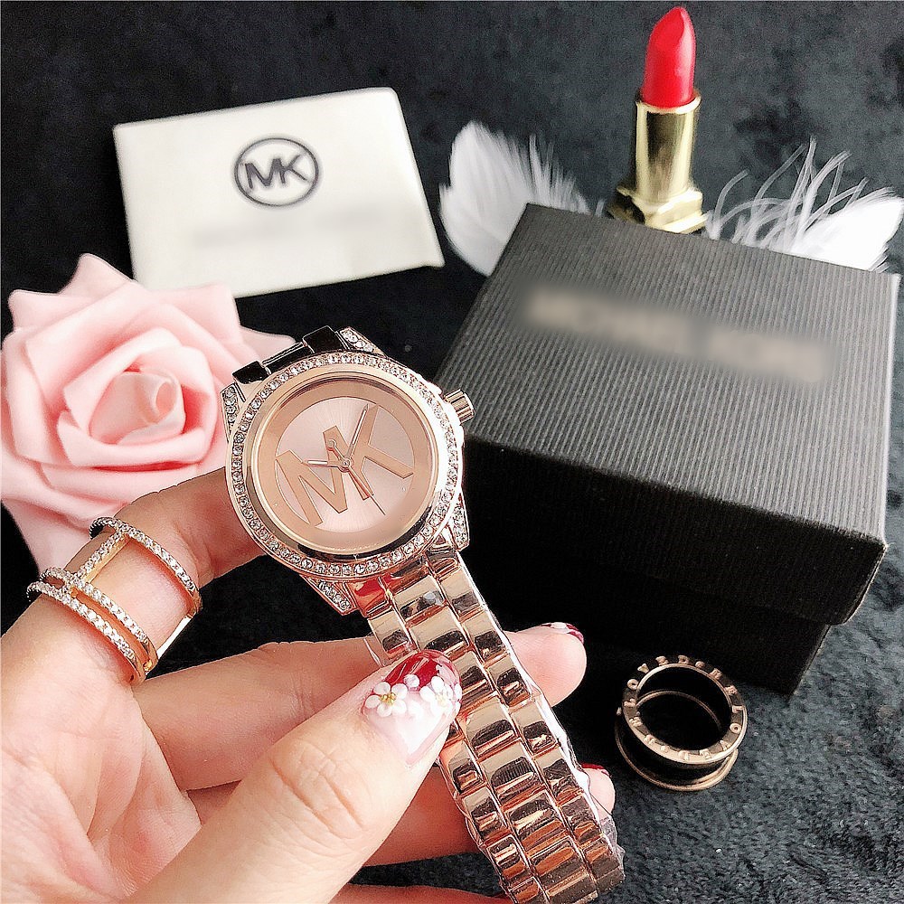 Relojes populares europeos y americanos, relojes casuales de cuarzo, relojes de estilo urbano simple, elegantes relojes de mujer de oro con incrustaciones de diamantes.