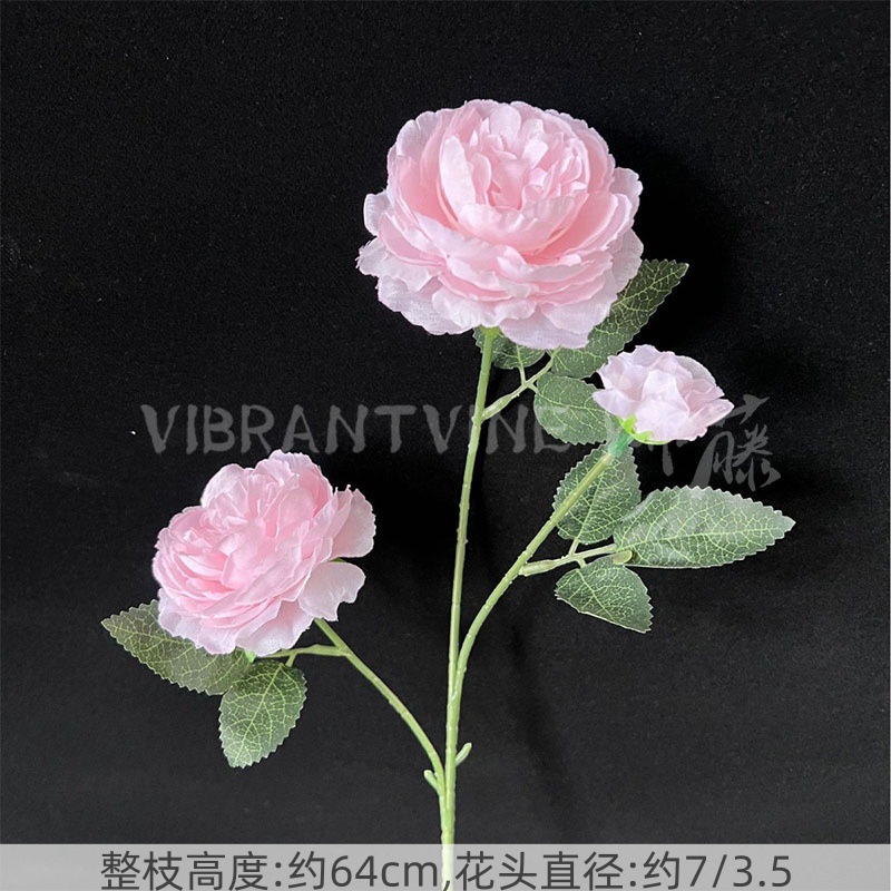 ピンク系のシミュレーション花の結婚式場は造景の偽の花の背景の壁を配置して花の天井の花の路を飾って生け花の娟花を導いています。