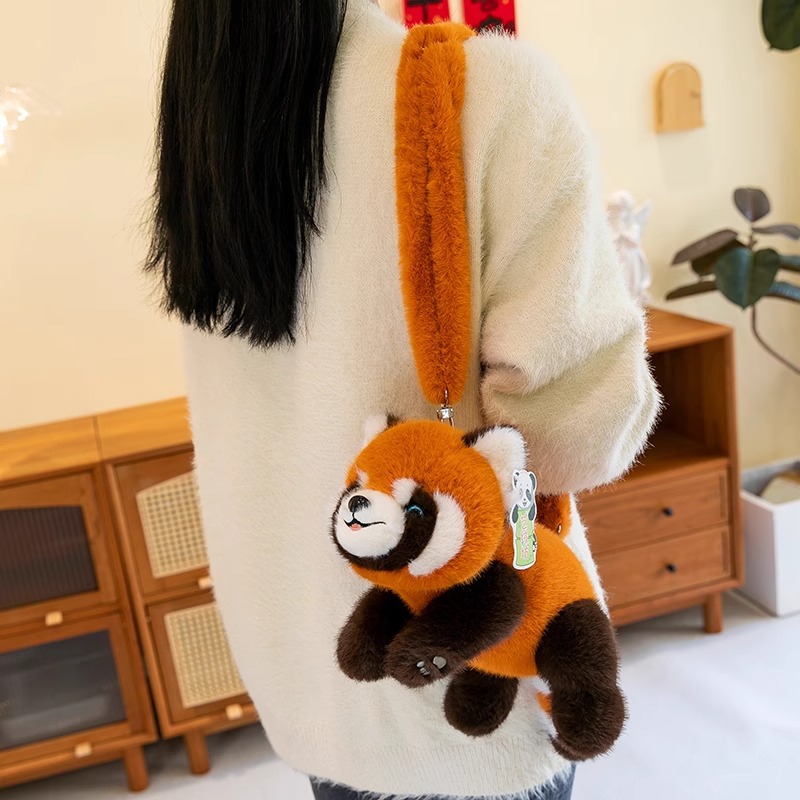 Venta al por mayor linda fiesta panda Hanhan peluche mapache muñeca muñeca creativa bolso de mensajero para niños