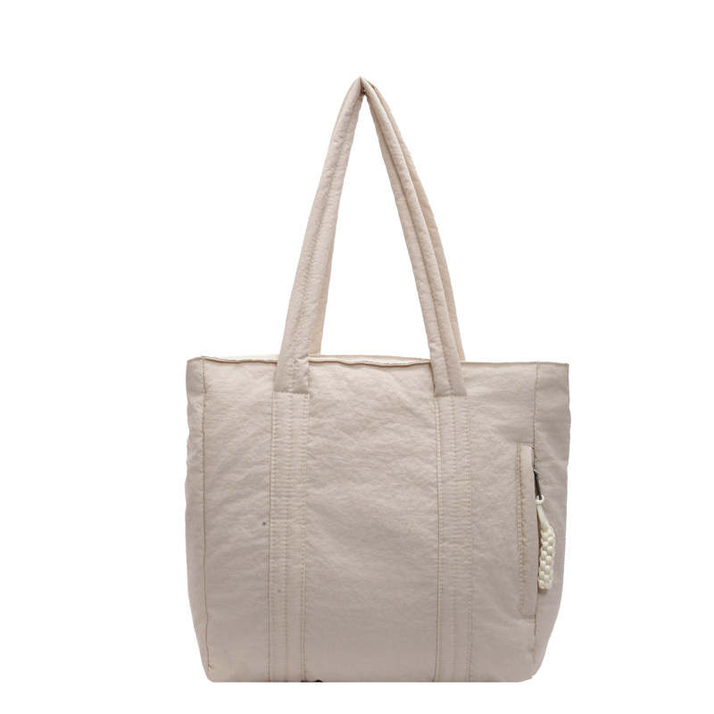 Bolso de nailon de gran capacidad para mujer 2024 nuevo otoño e invierno todo-fósforo bolso de la compra de un solo hombro bolso de viaje de clase simple