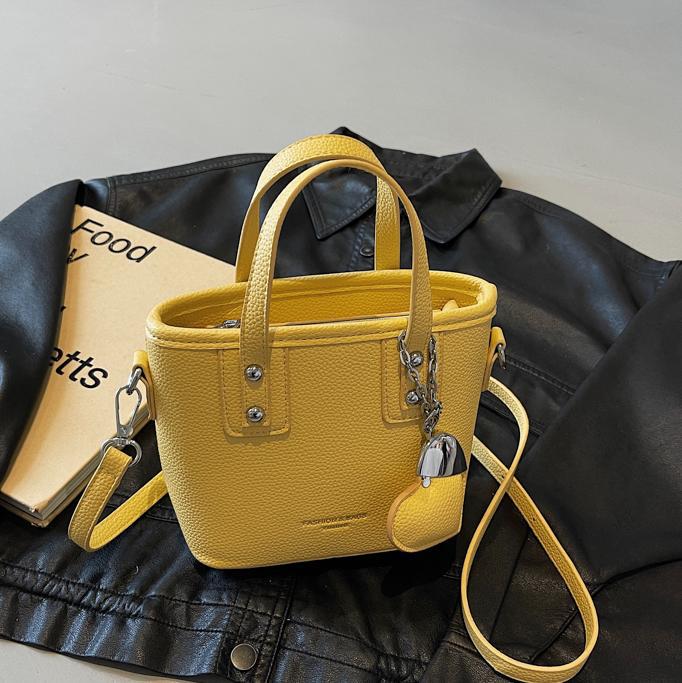 Bolso de cubo portátil transfronterizo simple y de alta gama para mujer 2025 nuevo bolso de hombro de estilo occidental de todo fósforo bolso de mensajero de moda