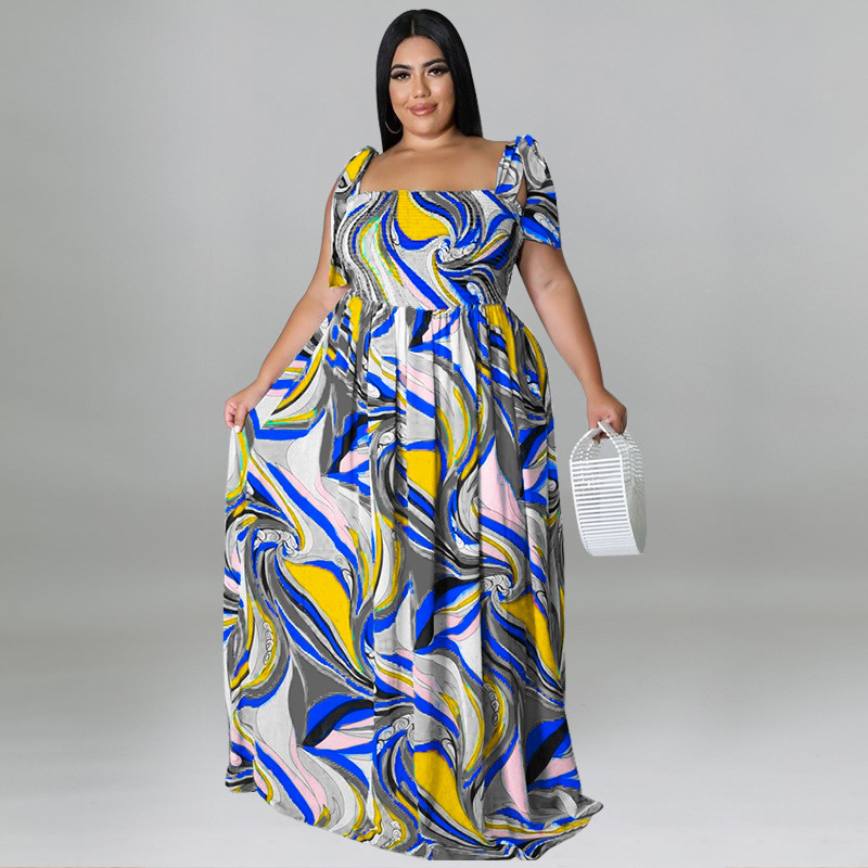 Maxi jurk met spaghettibandjes en smockwerk en strikprint_voghion.com