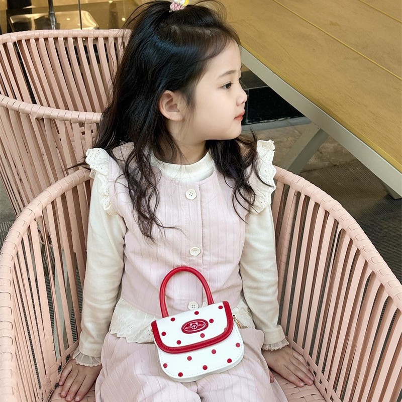 Dulce corazón de una niña pequeña princesa bolso de hombro de ondas de aire extranjero punto mini bolso de bebé bolso de hombro adorable oso pequeño bolso de niños