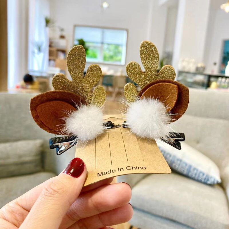国境を越えた新しいクリスマス鹿の角のヘアピンはミンクの毛のヘアピンのかわいいアニメの祝日の髪飾りのぬいぐるみのピンクのクリップをシミュレートします|undefined