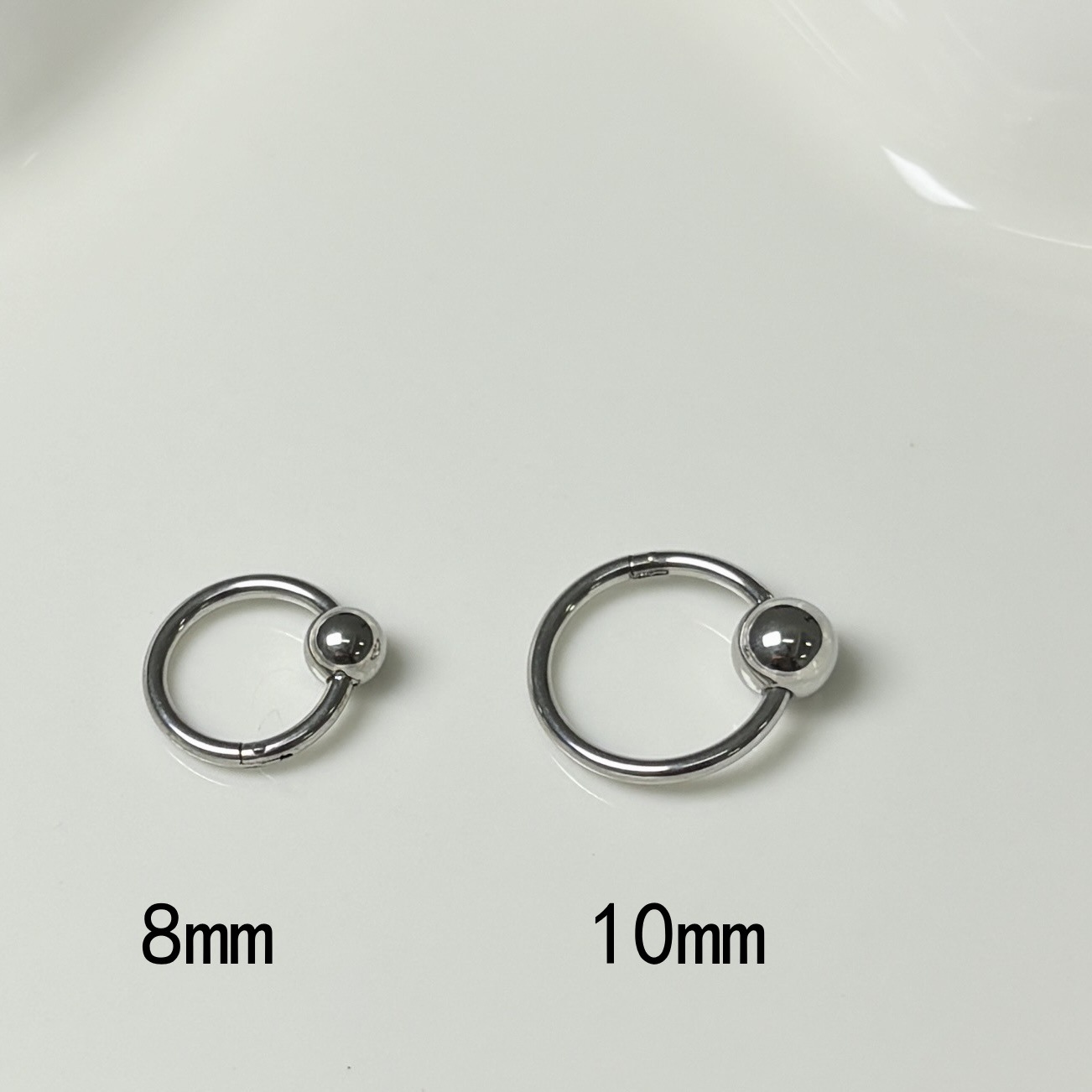 Labret stud lip piercing jewelry styling detail