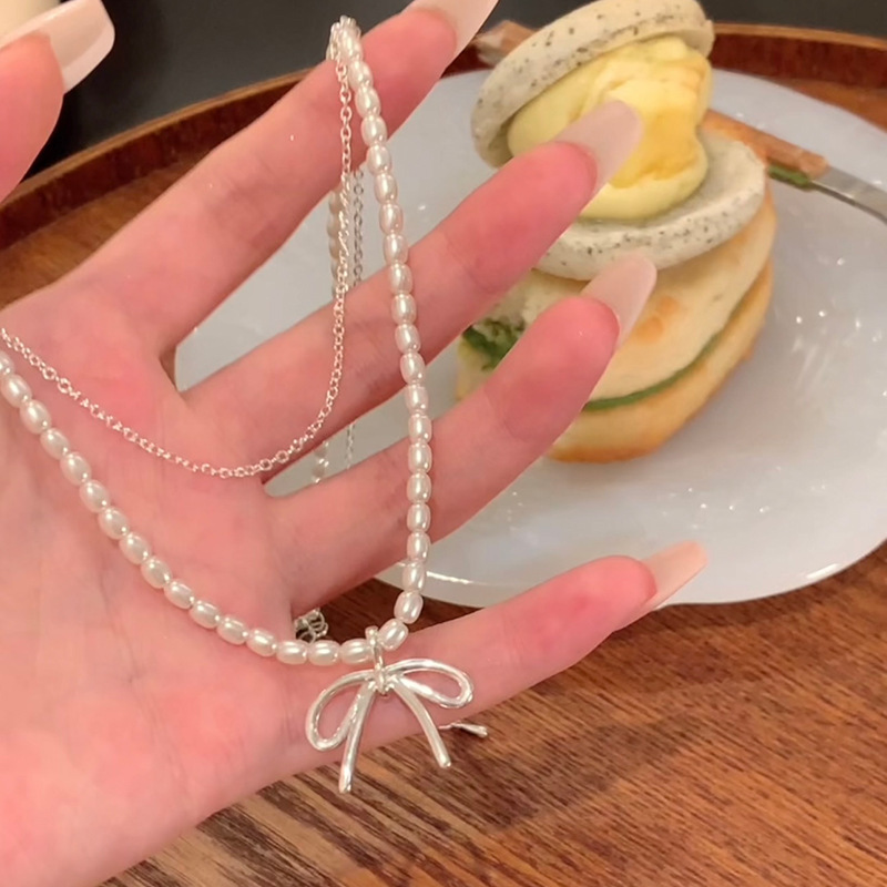 Xiaomi Bead Korean Blogger Double-layer Pearl Necklace Women's Bow Necklace Accessories Clavicle Chain High-end Light Luxury Xiaomi Bead Korean Blogger Double-layer Pearl Necklace Women's Bow Necklace Accessories Clavicle Chain High-end Light Luxury