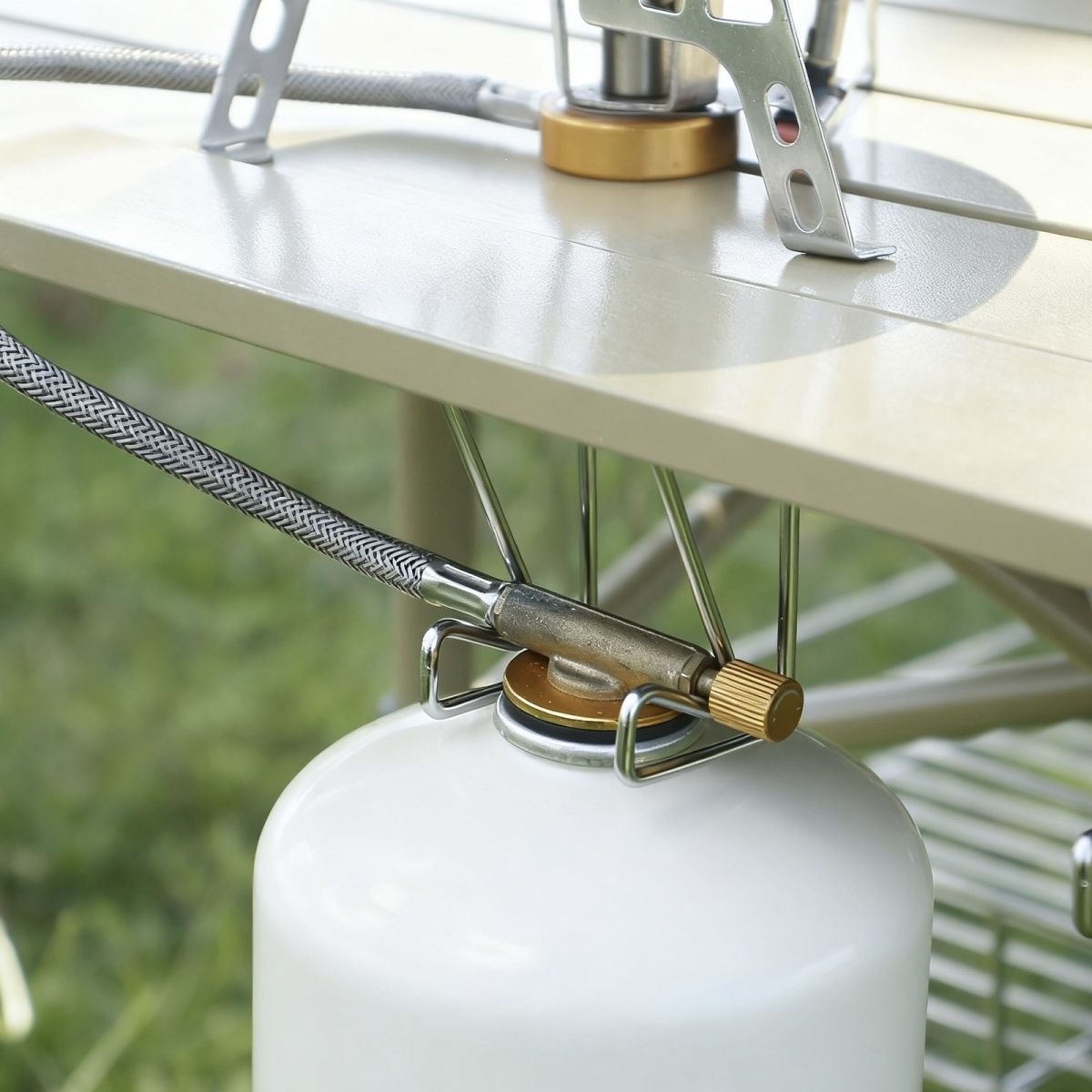 Outdoor camping roll-up table with stainless steel base, hook, and clip; outdoor trash rack accessories; gas canister accessories; support bracket