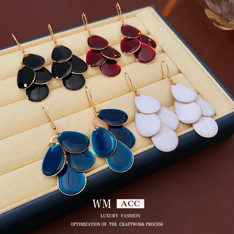Gotas de agua de color sólido, escamas, borlas, ganchos para las orejas, pendientes largos de alta gama europeos y americanos, tendencia de la moda, pendientes creativos, mujeres