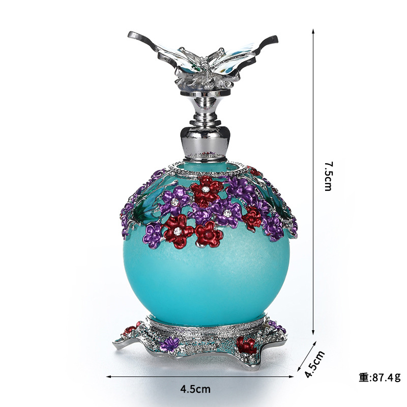 AliExpress Venta caliente mariposa 20ml botella de aceite de gran capacidad sub-embotellado botella de perfume de aleación de zinc botella de decoración al por mayor