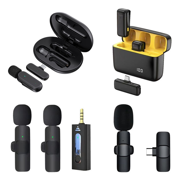 Wireless microphone with charging compar...