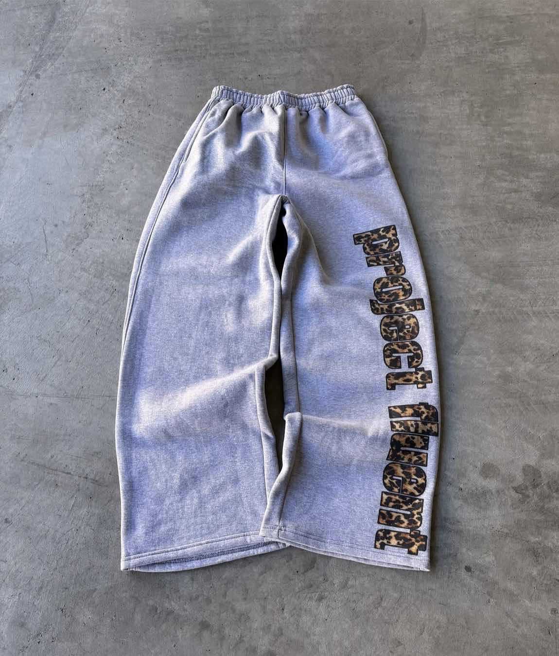 2026 Europe And The United States New Viral Trends Fashion Retro Versatile Casual Trousers Men And Women Street Leopard Print Loose Sweatpants_viptrois.com