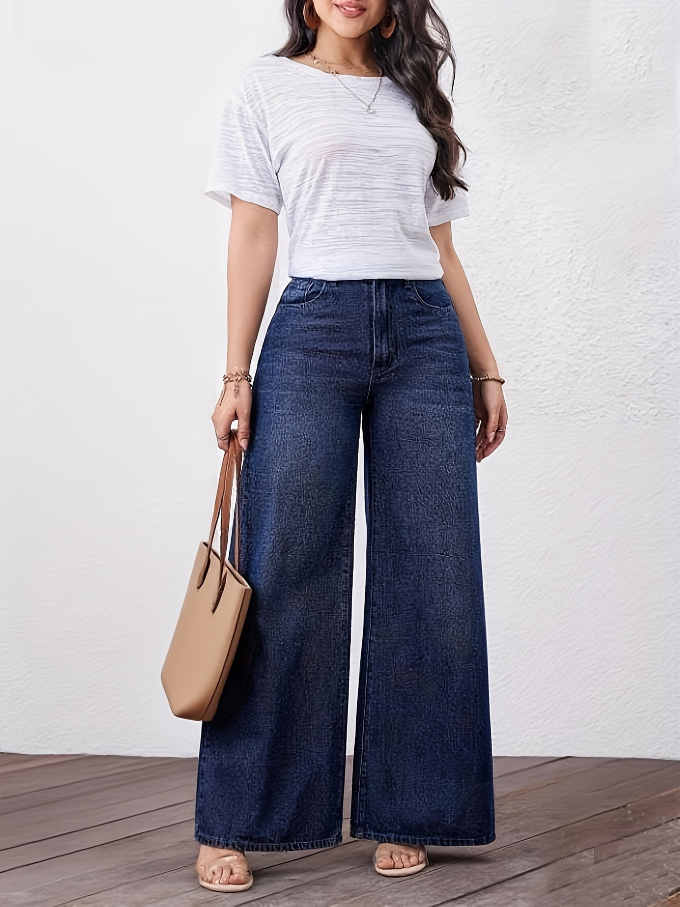 Dames jeans met hoge taille en wijde pijpen washed denim_voghion.com
