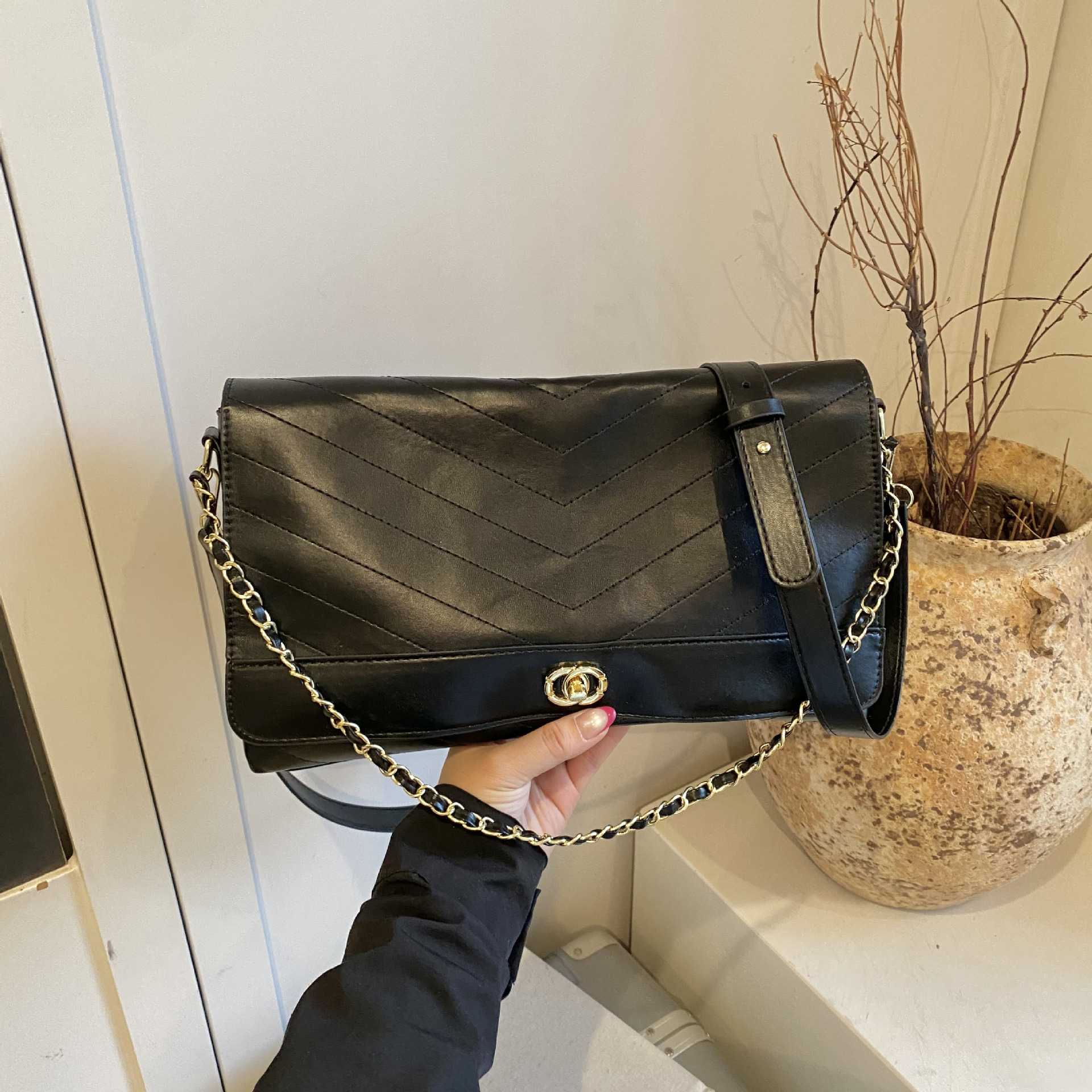 Xiaoxiang Lingfeng chain cross-border mochila bolso de hombro de moda europea y americana de viaje diario bolso de cerradura de comercio exterior