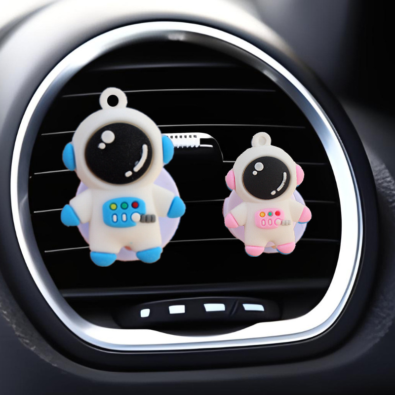 Clip de salida de aire de automóvil astronauta muñeca perfumes de automóviles dibujos animados adornos de decoración de automóviles plástico interior