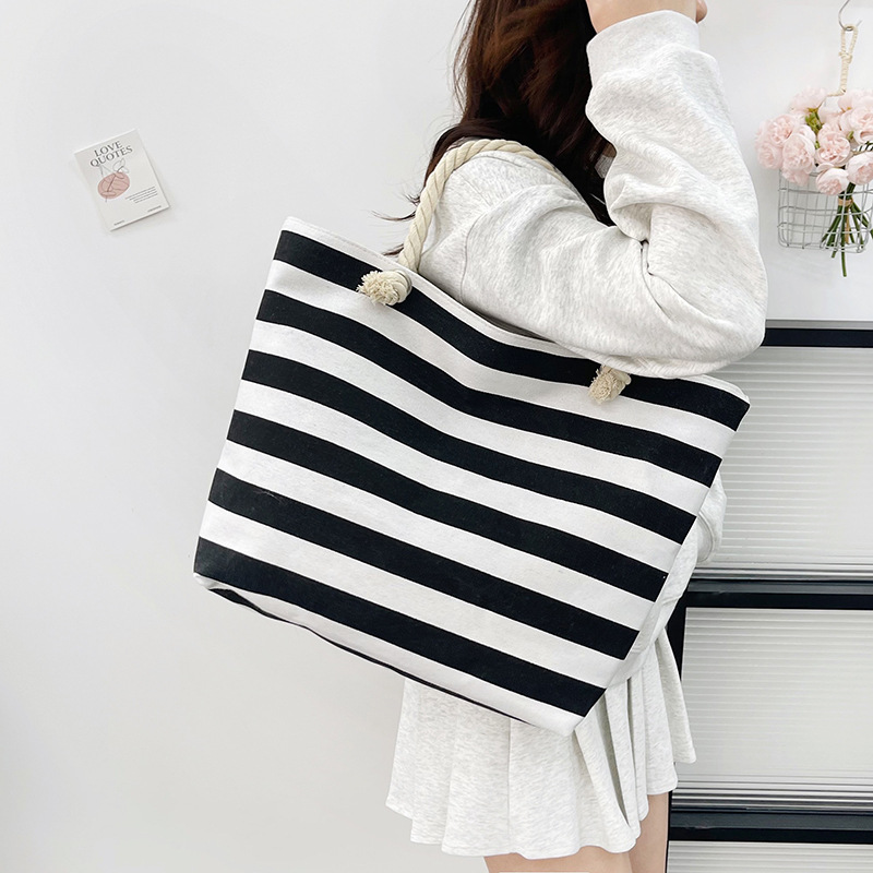 Bolsas de lona a rayas de moda transfronterizas, bolsas de mano japonesas de gran capacidad, bolsas de hombro, bolsas de hombro en stock.