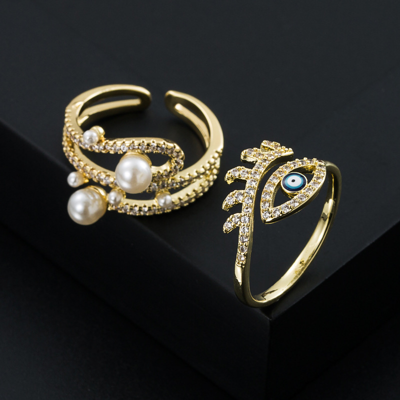 European and American fashion copperplated goldplated microinlaid zircon eyes pearl ringpicture3