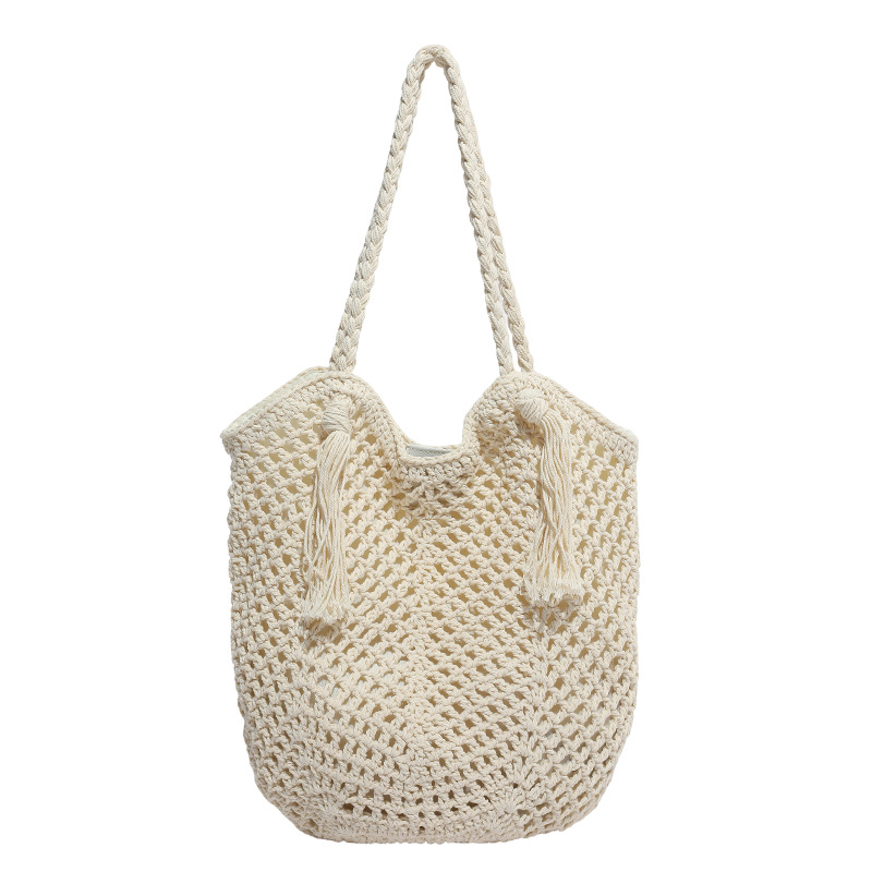 Bolso de vacaciones junto al mar 2025 verano nuevo estilo bolso femenino tejido con flecos bolso de playa de gran capacidad