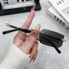 新しいフレームレスファッショナブルな色が変わるメガネヨーロッパとアメリカのトレンディなカットエッジ色が変わるフラットメガネフレームレスフォトクロミックフラットメガネ