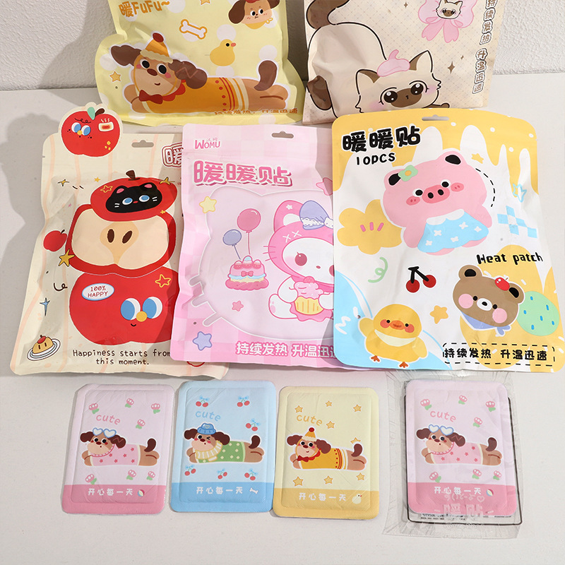 カラフルな漫画の暖かい貼り付けの10枚は袋の中に入っています。|undefined