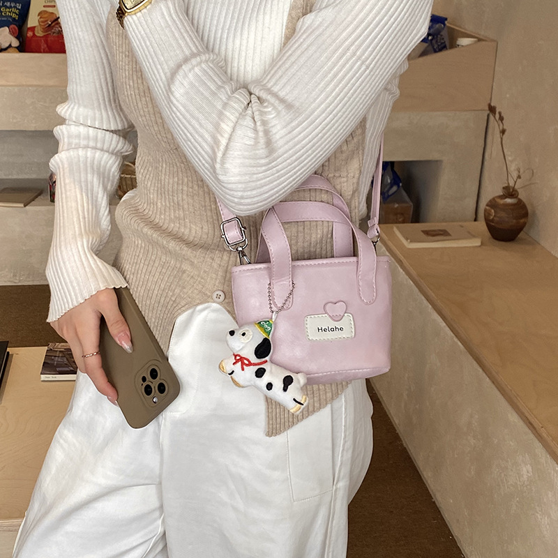 Bolso de moda coreano para niños y niñas simple color sólido pequeño y ligero bolso de cestas de bebés nuevos accesorios para niños bolso