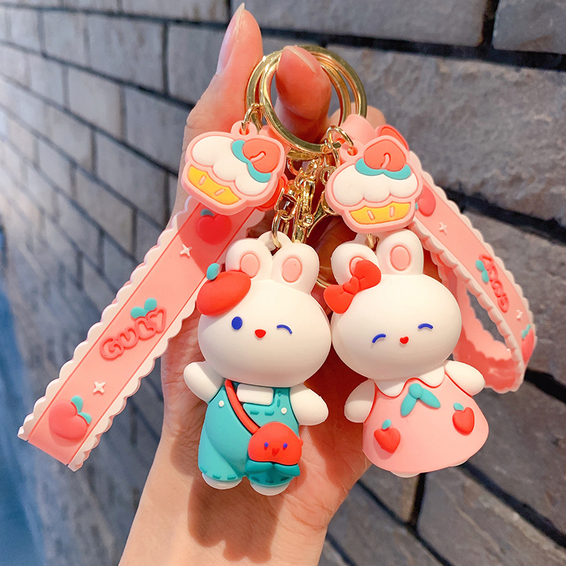 Lindo conejito muñeca llavero coche colgante simple dibujos animados conejo blanco muñeca llavero anillo pequeña joyería
