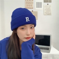 帽子の冬の女性の高顔の丸い顔の韓国版の学生の洋気の百合の防寒の保温は顔の小さいニットの毛糸の帽子を現します。