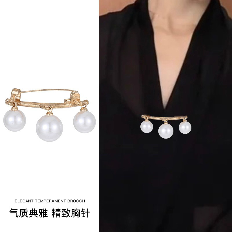 Temperamento bowknot perla alfileres mujer exquisita hebilla anti-luz sensación de alto nivel cintura artefacto cintura pantalones pequeña hebilla fija