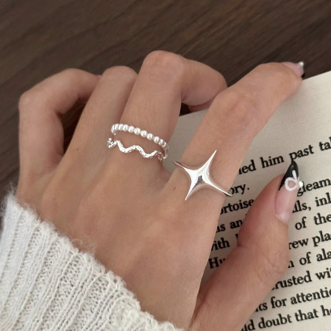 S925 sterling silver, polished, double-pointed star ring for women, featuring a minimalist and cool aesthetic, perfect for layering, with a cross-shaped star design