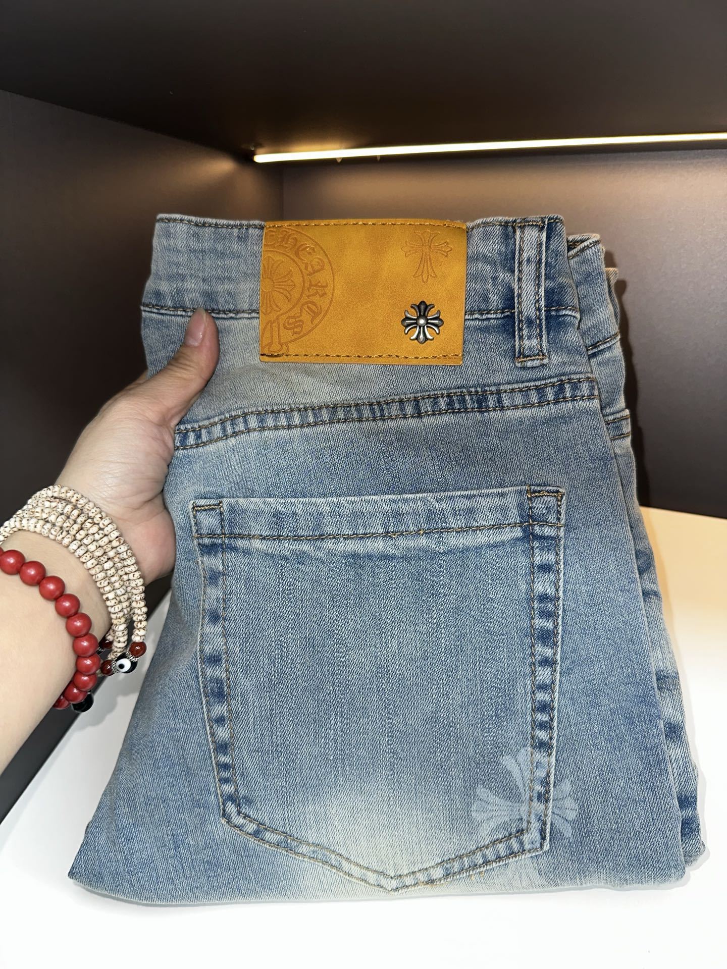 Nuevos productos vaqueros europeos de alta gama para hombres Four Seasons Cross Stereo Print Slim Slim Elástico Lavado Pantalones rectos pequeños