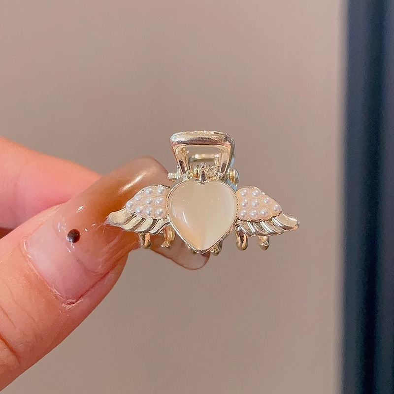 Nuevo medio lazo pelo pequeño clip simple tiburón clip accesorios para el cabello para las mujeres Pequeño clip de metal tamaño pequeño perla horquilla rota 2024