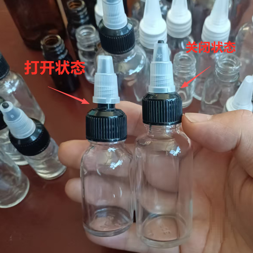 Botella de punta de vidrio Botella de aceite esencial Botella de esencia Botella de agua Botella de solución bruta Botella vacía Botella de goteo de punta rotativa Botella sellada