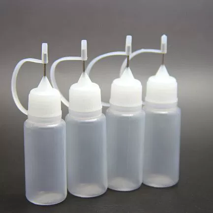 Bottle 5 ml & 10 ml, squeezable PE body with stainless steel pin tip and PP cap