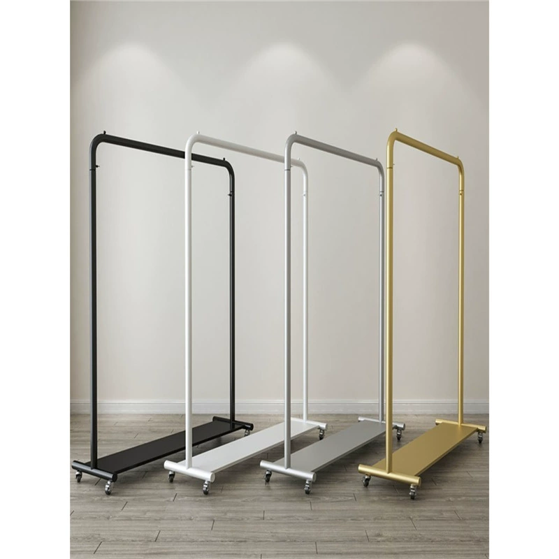 Магазин одежды стеллаж наполаженная женская полка золотая вешалка для одежды