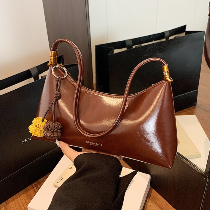 Bolsos de brazo franceses de alto nivel de invierno para mujeres 2025, nuevos bolsos de hombro de moda versátiles, bolsos retro