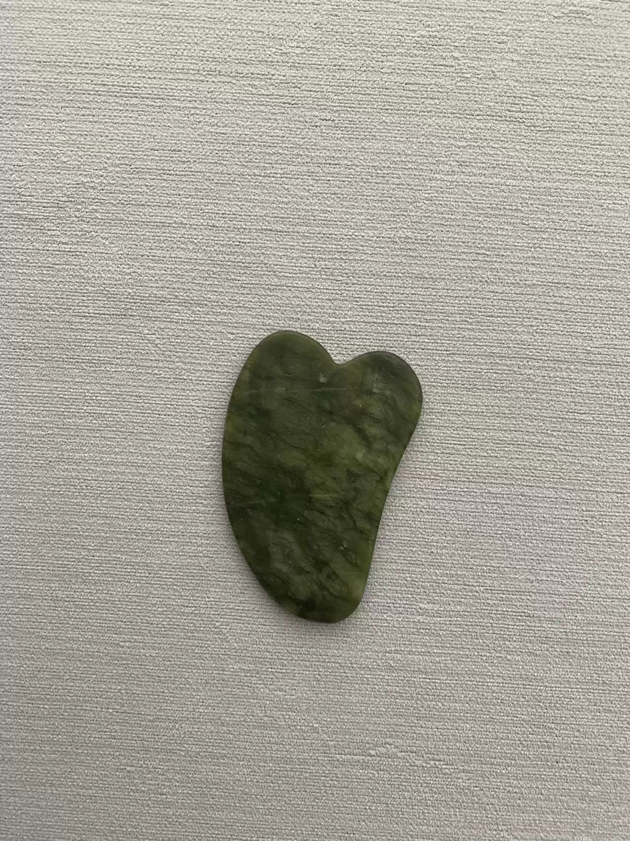 ��Ȼ��ʯ����������Ħ���ݰ�˫ͷ���ֻ������۲��沿���ְ�Ħ��