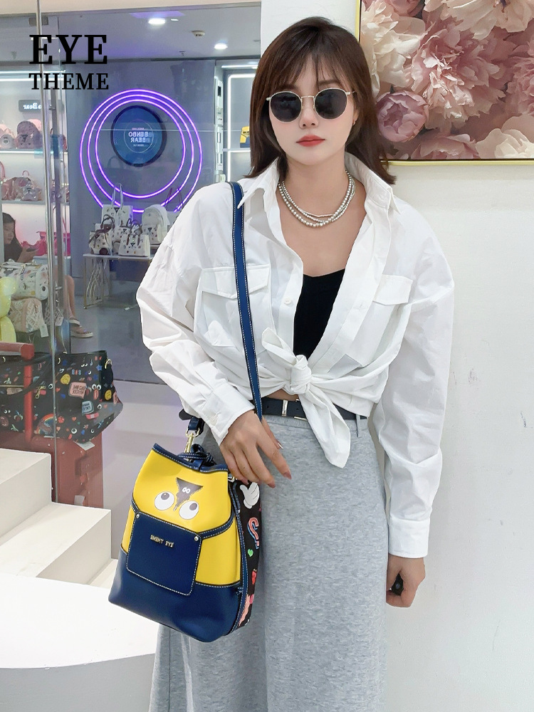 Emballado amarillo damas casuales nueva tendencia bolso de calle impresión inclinada extraña bolso de cubo 2658 #