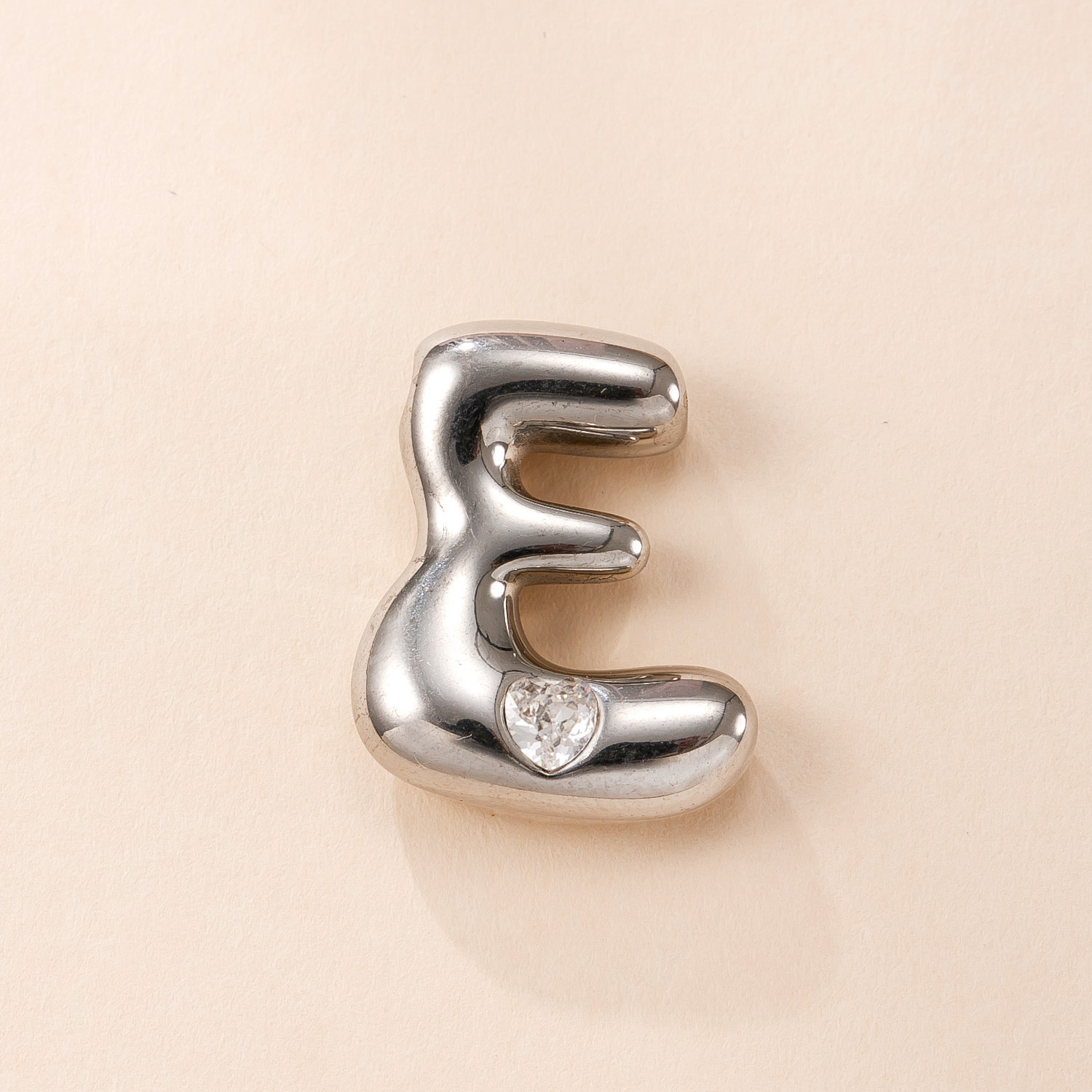 Colgante único transfronterizo de joyería de acero inoxidable fundición con incrustaciones de diamantes de color 26 letras accesorios de collar moda simple pulsera briy