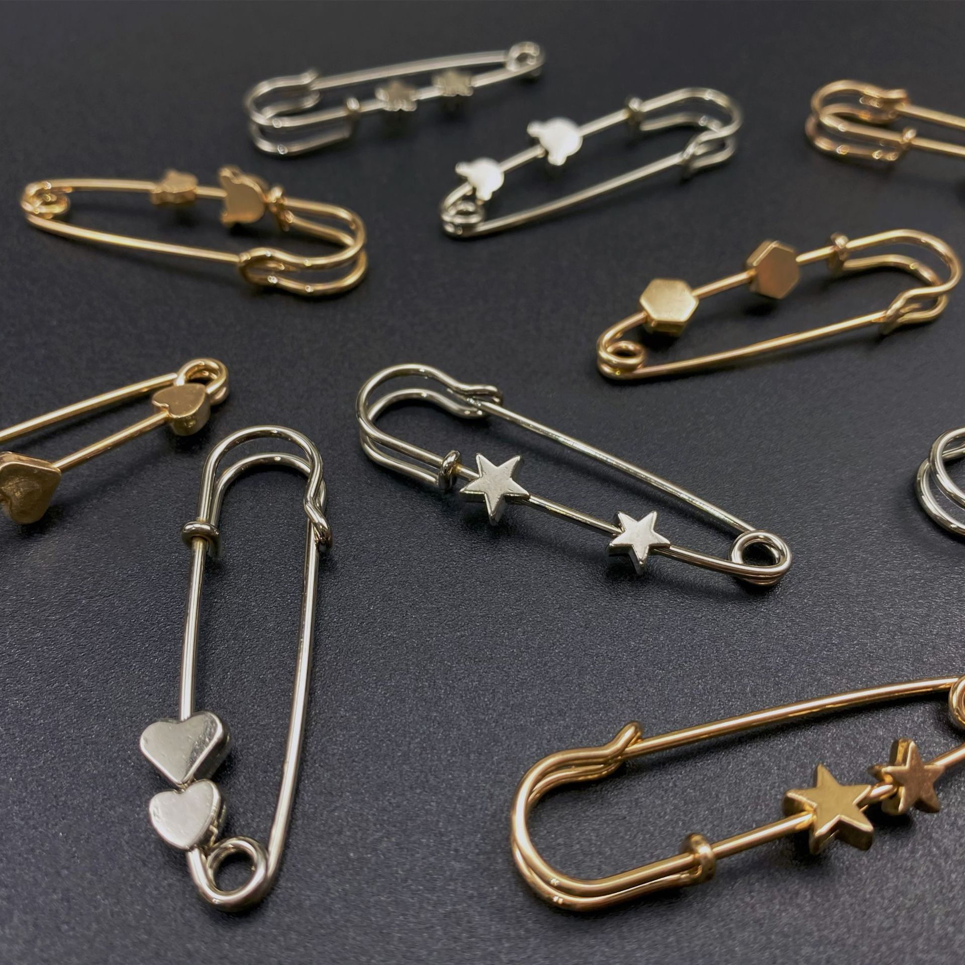 Exquisito tamaño pequeño de reducción de cintura pin cintura ajustable pantalones apretar artefacto ropa fija broche anti-exposición