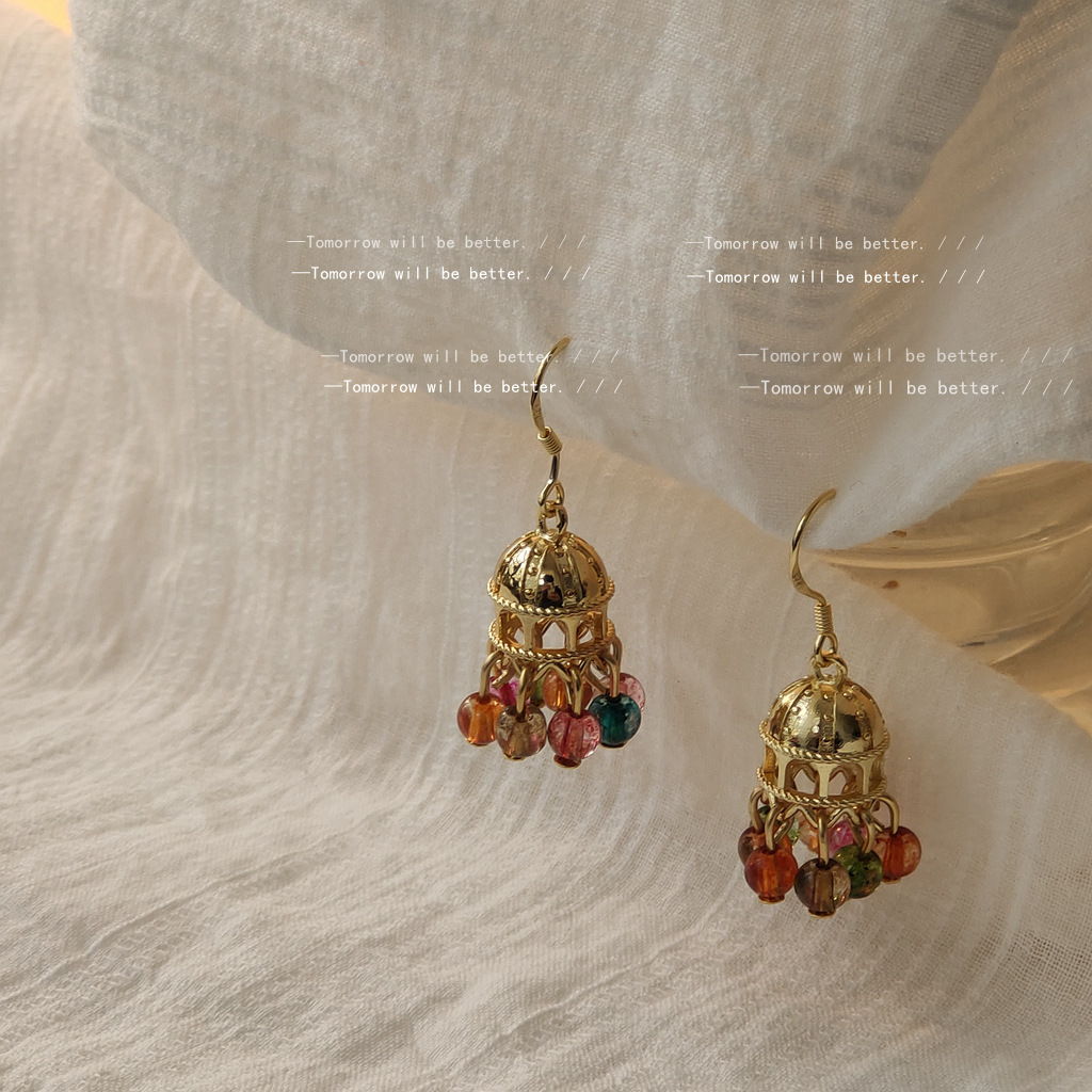 Estilo étnico 925 aguja de plata chapada 14K diseño hecho a mano sentido tridimensional carillones de viento pendientes mujer pendientes de borla corta femenina transmisión en vivo