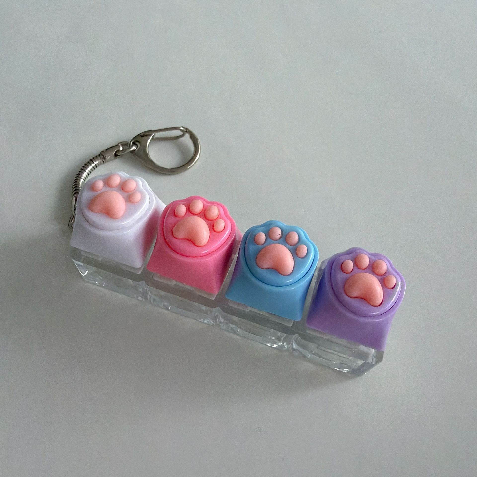 Four-button transparent shell-silicone cat claw (white