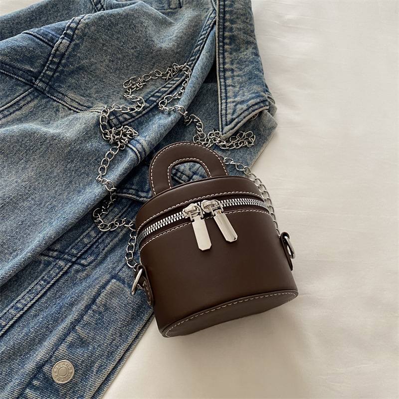 Otoño y invierno coreano bolso de cubo de color contraste para mujeres 2024 nuevo bolso de mano de moda de un hombro bolso de cilindro casual