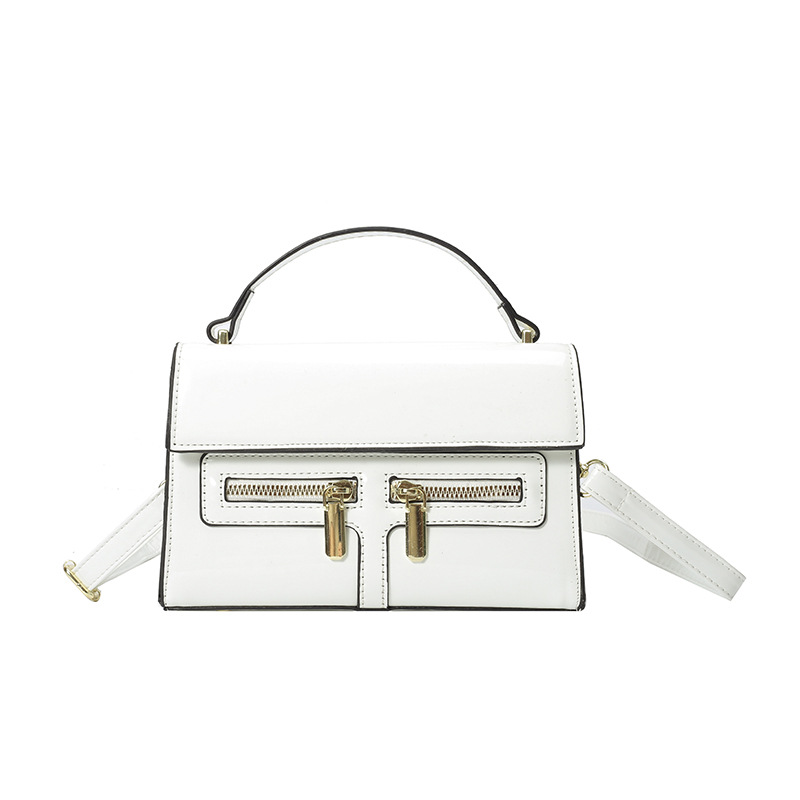 Bolso de diseño de nicho 2025 verano nuevo bolso femenino de alta calidad textura bolso de hombro charol brillante bolso de mensajero marea