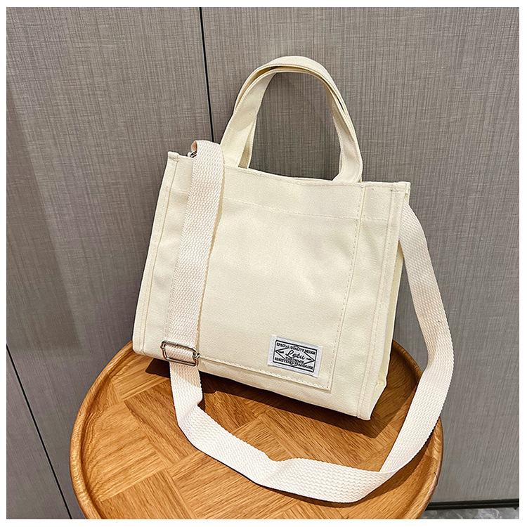 257g Weight Polyester Lining Material Sewing Thread Fashion Element Zipper Closure Type Single Shoulder Strap, Top Handle Strap Type Square Bag Bags Type Casual Occasion Canvas Material Solid Color Pattern All Seasons Season Women's Gender Streetwear Style Square Shape Women's Canvas Solid Color Streetwear Sewing Thread Square Zipper Square Bag 27