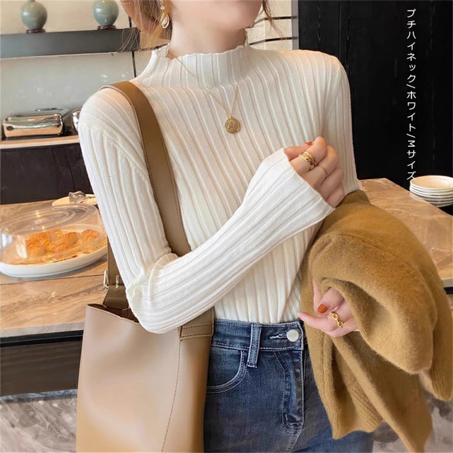 日本式のレースの半高襟のセーターの底のシャツの女性の秋冬の修身の中に白い上着を掛けます。
