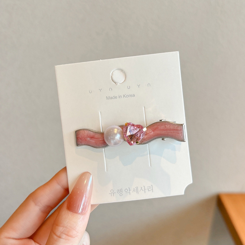 Coreana lateral frange clip de cabello de la frente de mujer sensación avanzada 2025 nuevo toque de dopamina clip de boca de pato